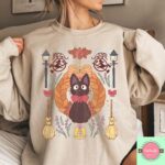 Kiki-and-Jiji-Graphic-Tee-Sapelle-1